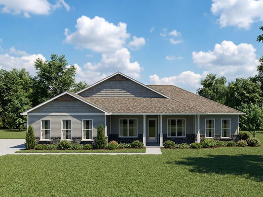 One-story house with gray exterior and brown roof under a blue sky with clouds.